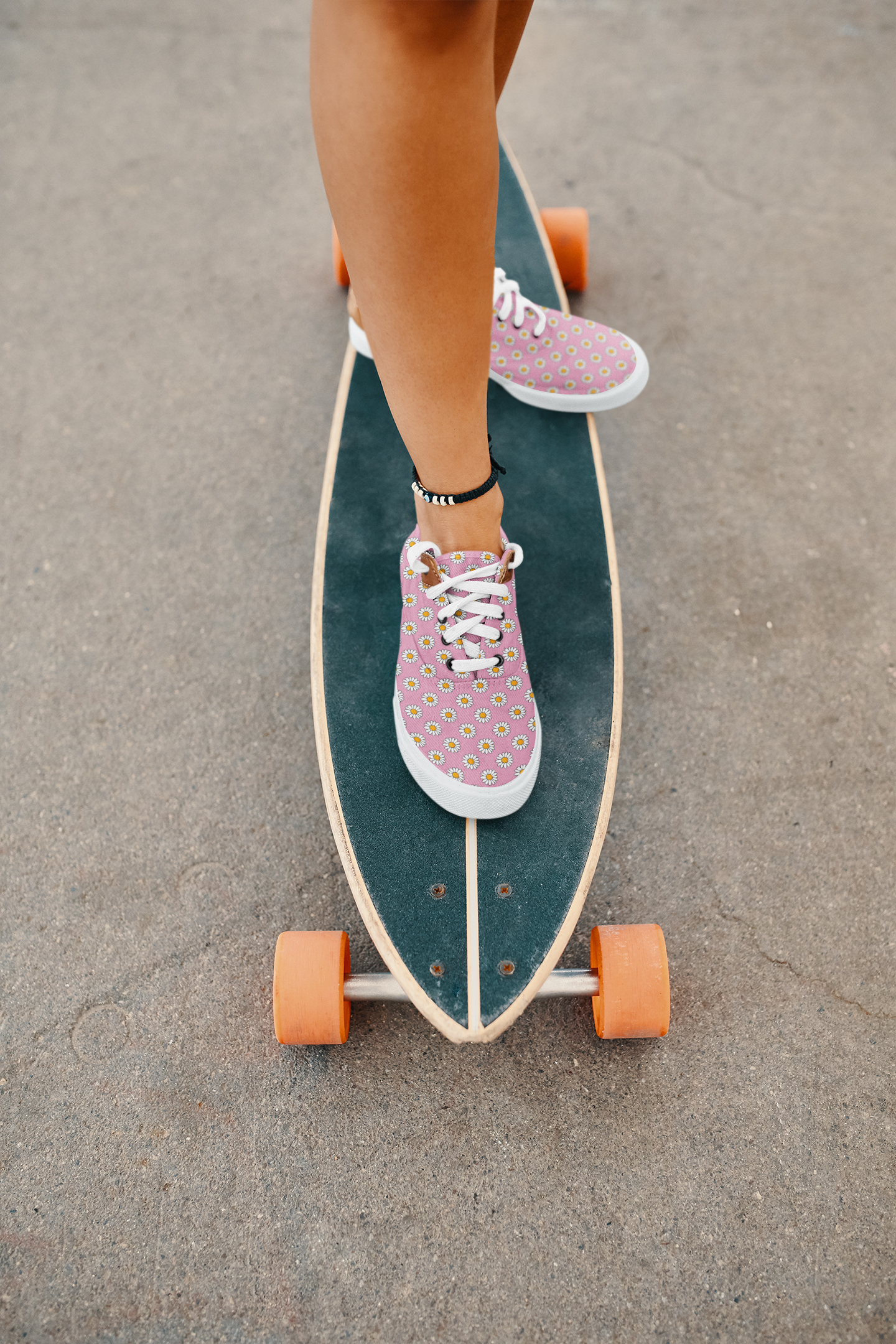daisy and pink sneakers-mockup-of-a-woman-riding-a-longboard