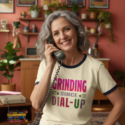 Grinding since dial up  woman on an old phone game over gear