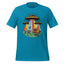 A bright turquoise blue short-sleeve t-shirt with a colorful retro graphic of three UFOs, glowing beams of light, a yellow car, and cows on a grassy field, shown against a plain white background.