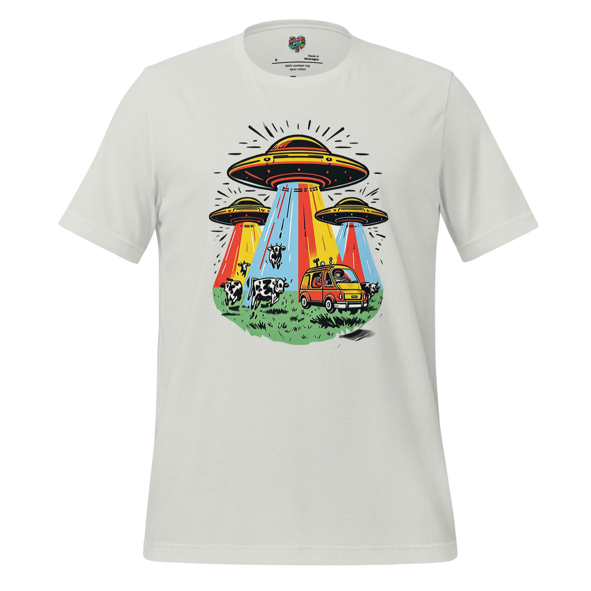 A light gray crewneck t-shirt featuring a colorful retro graphic of three UFOs with rainbow beams of light, a yellow car, and cows on a grassy field.