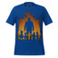 A royal blue short-sleeve crewneck t-shirt featuring a Halloween-themed graphic print on the front. The print shows a large dark blue silhouette of a man standing with a group of children, set against a warm orange and brown autumn tree silhouette background.