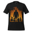 A black short-sleeve crewneck t-shirt featuring a Halloween-themed graphic print on the front. The print shows a large silhouette of a man in a top hat and suit, accompanied by a witch, a cat in a pumpkin suit, and two children, all set against a glowing orange background with silhouetted trees.