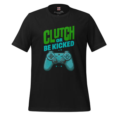 A black short-sleeve t-shirt with a graphic on the front that reads 'CLUTCH OR BE KICKED' in green and teal text above a teal video game controller illustration, shown on a plain white background.