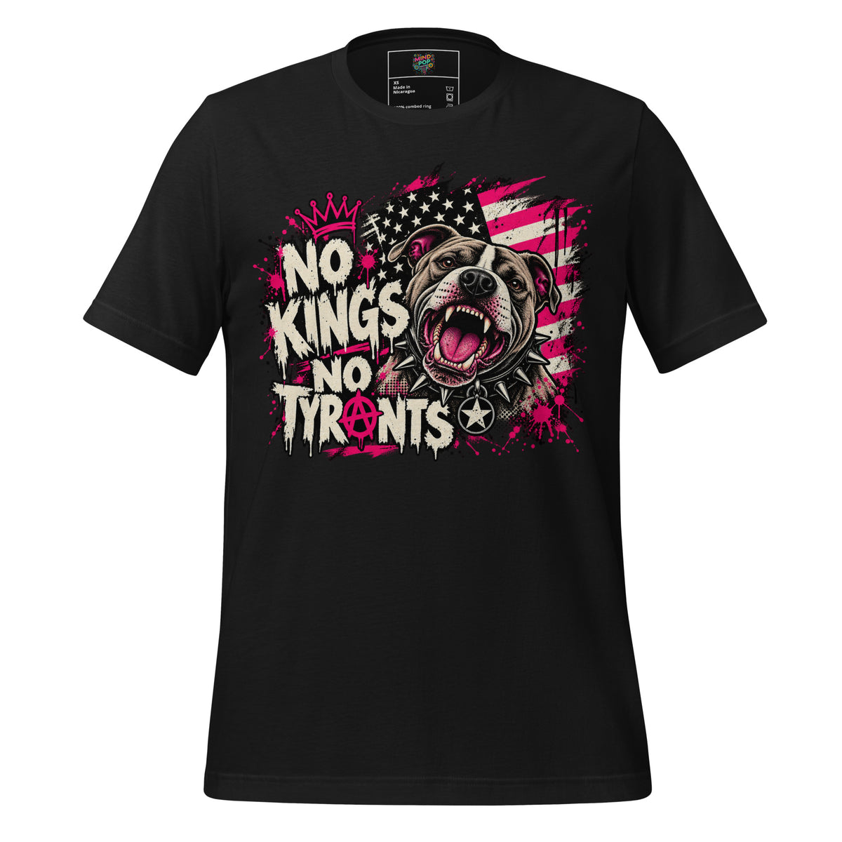 A black short-sleeve crewneck t-shirt featuring a bold graphic print on the front. The design includes the text 'NO KINGS NO TYRANTS' in a distressed white font, a snarling pitbull dog illustration, a pink crown, and a stylized American flag with pink and white stripes and black stars.